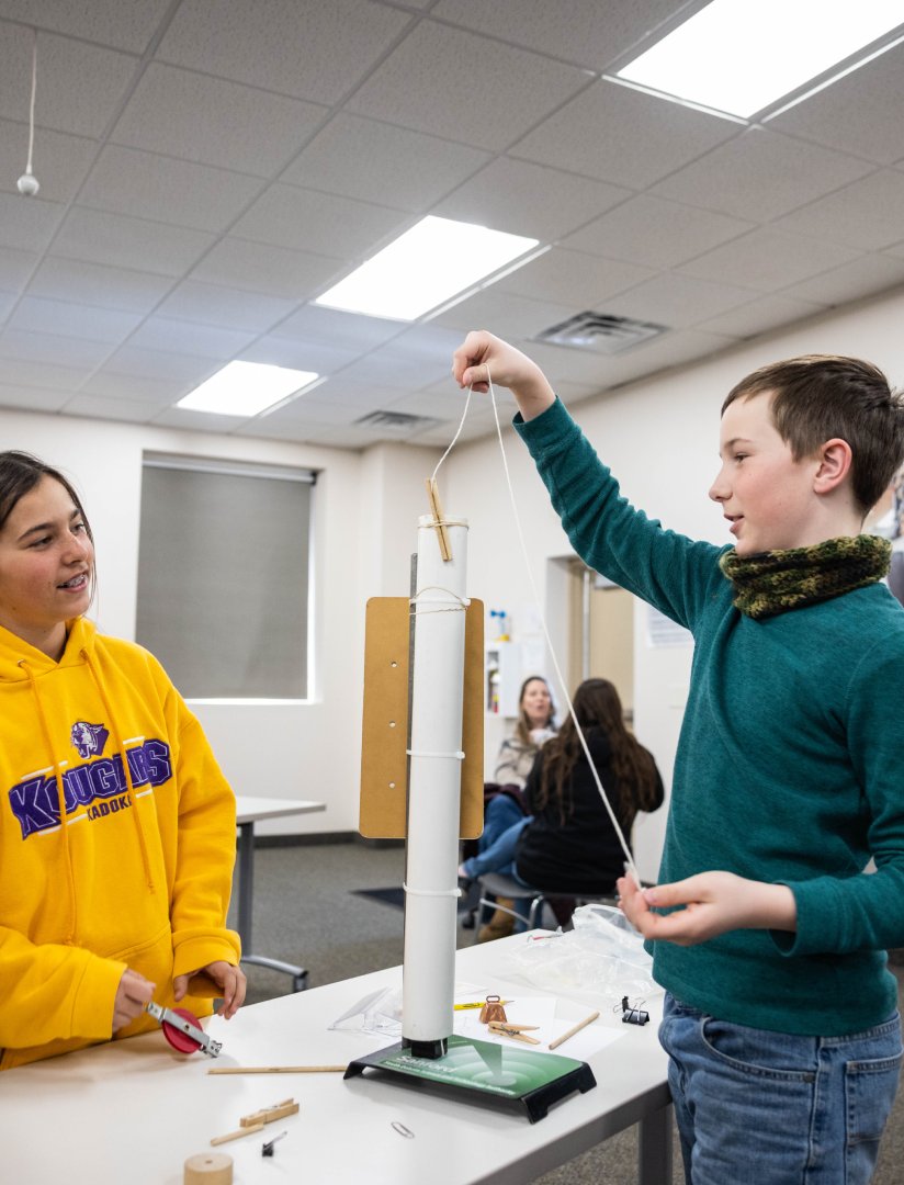 Students working on engineering challenges